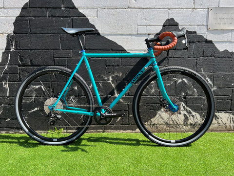 We are pretty pleased with our latest Bath Outdoors custom build. This Surly Straggler 700cc complete build is brimming with style and capability. We stepped back from some of the more lairy colours we have built in the shop over the past year for something more subtle and we think we have nailed it.