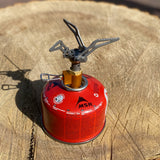 bathoutdoors.co.uk Titanium folding camping stove The ultimate material for the ultimate adventure. This light weight folding stove head is the perfect centre piece to your camp kitchen.  49g in stash bag 45g actual weight